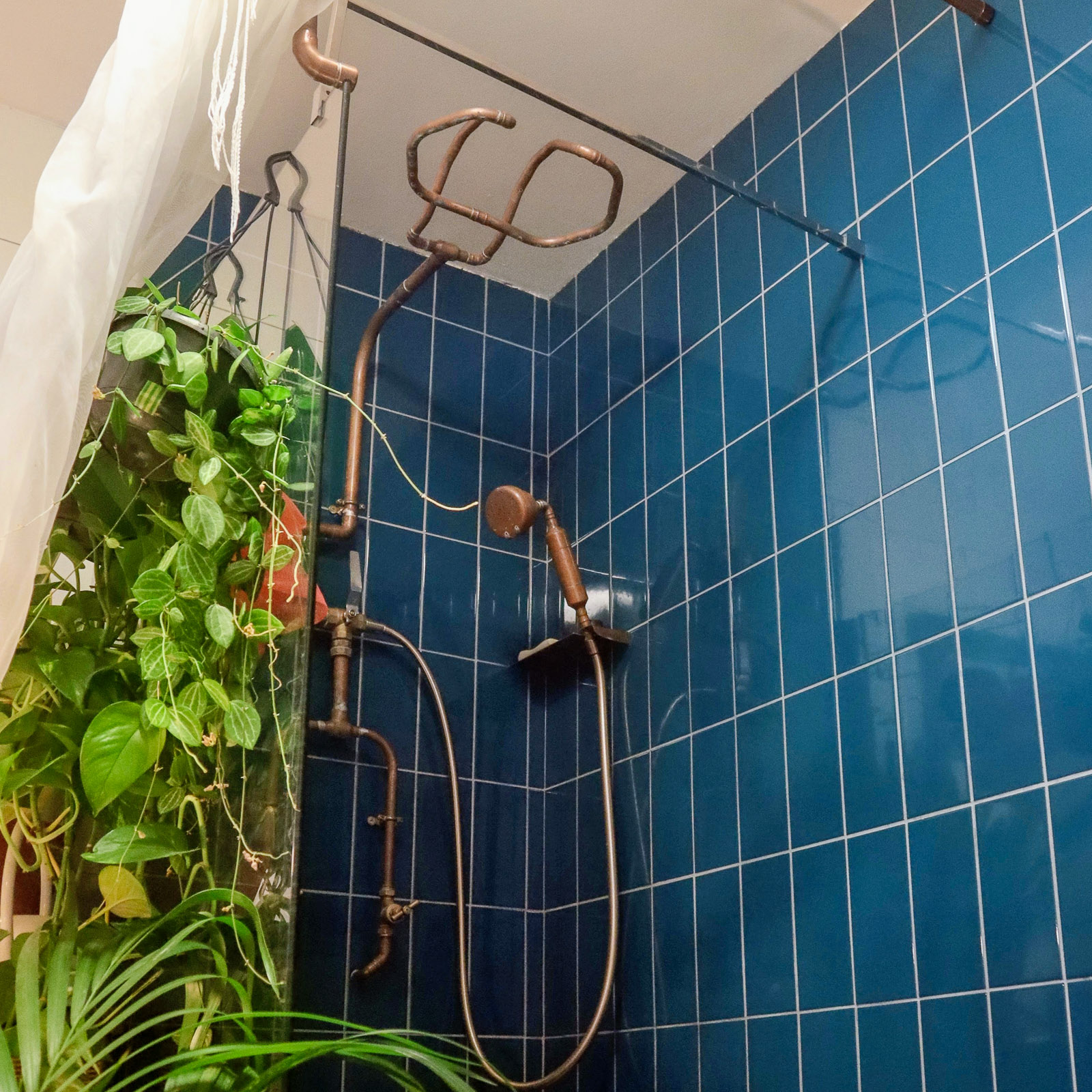 Bespoke bathroom with custom copper pipework and shower, Paddock Close